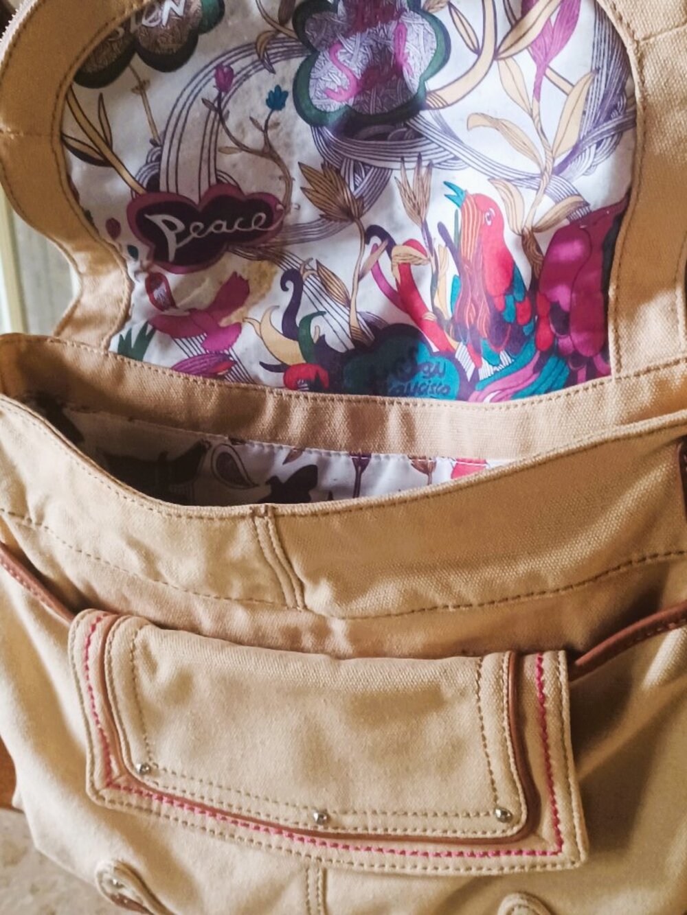 The Sak Tan Floral Peace Crossbody Bag Magnetic Closure Lined Outer Pockets